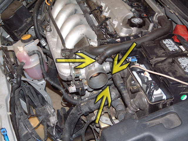  underneath the Throttle Body and connect to the Idle Air control valve.